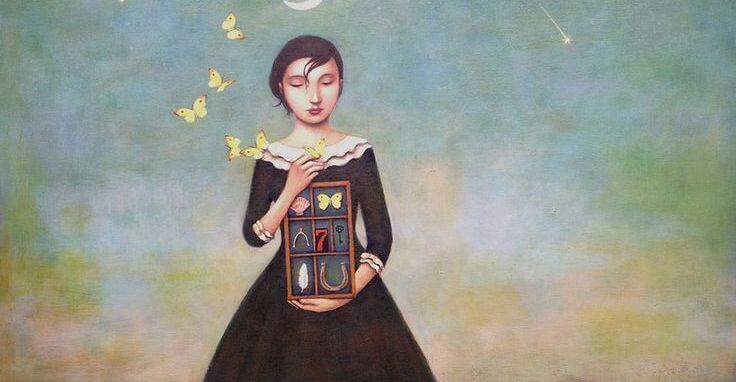 Kvinna med fjärilar som förvarar sina upplevelser i en box