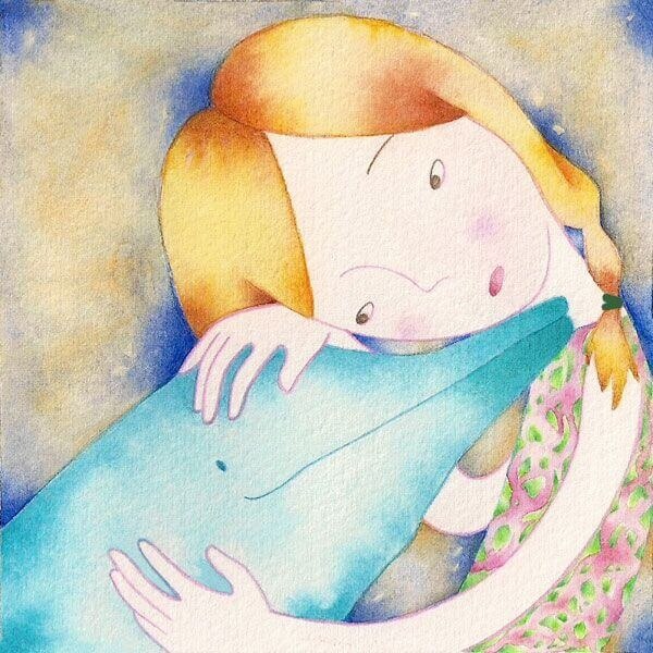 Flicka och delfin