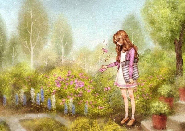 Flicka plockar blommor