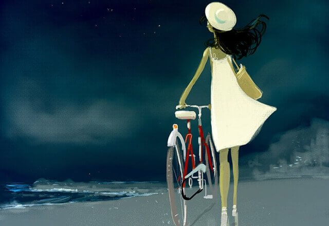 Kvinna med cykel