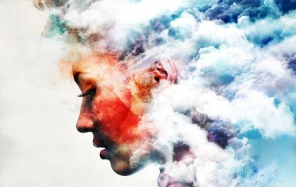 Profil bland moln som symbol för Alzheimers sjukdom