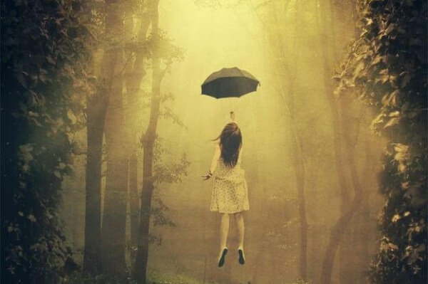 Flyger med paraply och fokuserar på hälsosamma beteenden