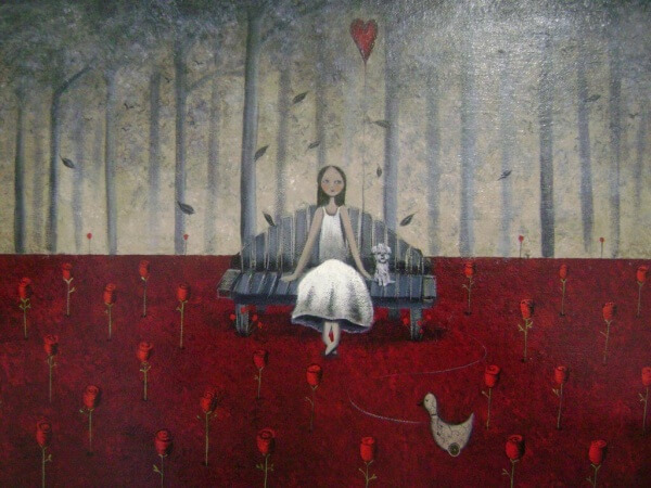 Kvinna på soffa med hund