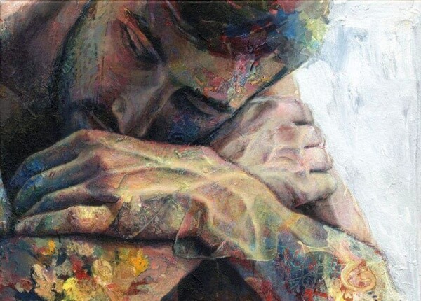 Man med korsade armar