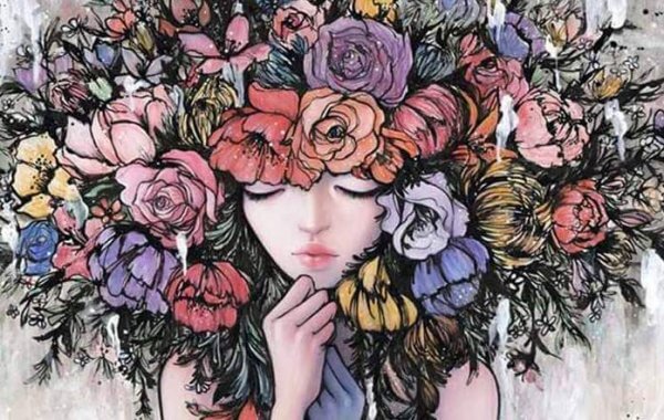 Flicka med blommor i håret som tänker på det enda som kunde ske