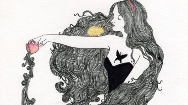 Kvinna med hårsvall som symboliserar kärlek för introverta