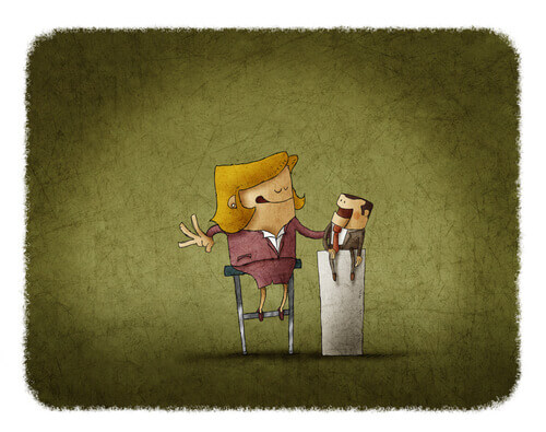 Buktalare med docka som använder suggestion