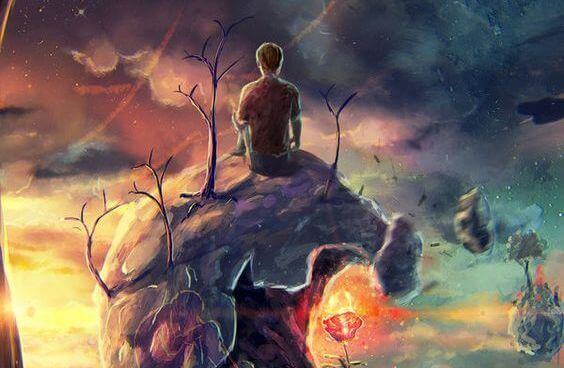 Man på berg som känner oro och ångest