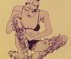 Kvinna rakar blommor
