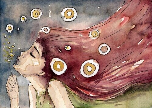 Flicka som blåser bubblor