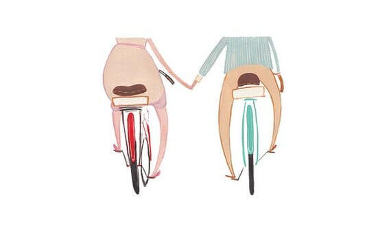 Cyklande par som visar att kärlek behöver en spegel