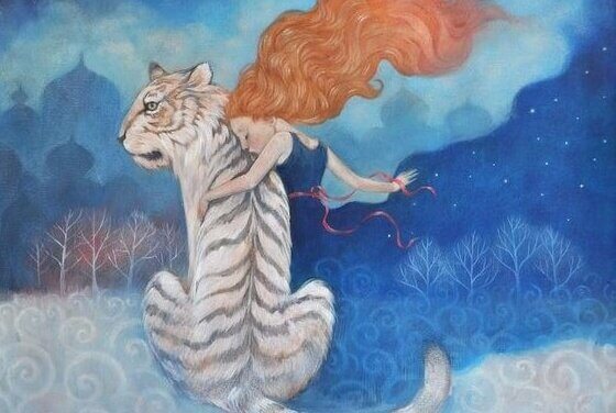 Kvinna och vit tiger