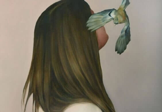 Kvinna med fågel