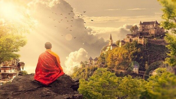 Buddhistisk munk som mediterar