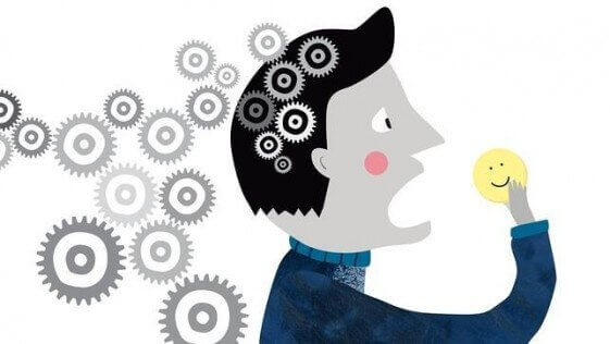 Man som håller glad smiley