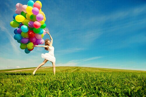 Person med ballonger