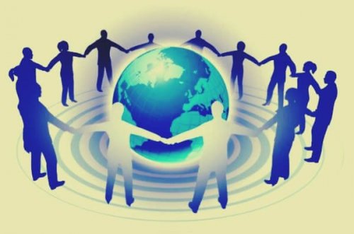 Personer som håller händerna runt en jordglob.