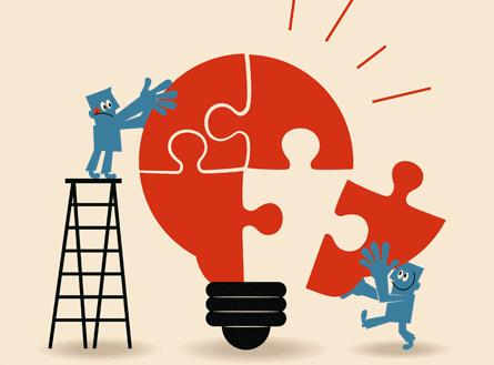 Gubbar som bygger pussel.