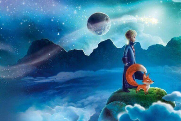 Pojke med räv på bergstopp