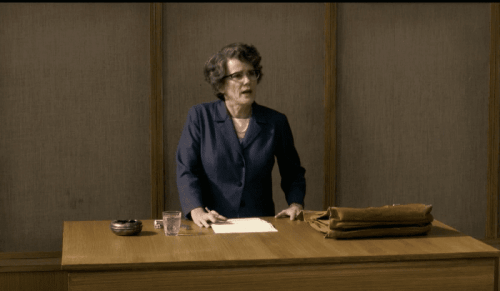 En tänkare vid katedern.