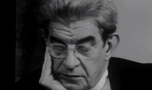Lacan med glasögon.