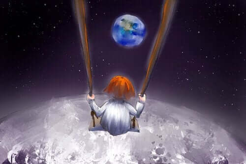 Pojke i en gunga på månen med önskan om ett kalejdoskop